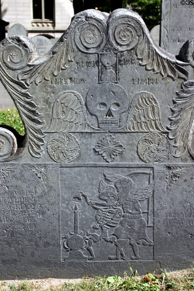 Tombstone with death symbols in King's Chapel Burying Ground. Boston, MA.