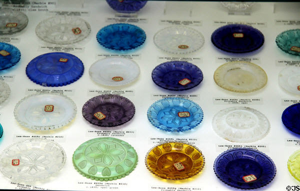 Glass cup plates used to put cups on while tea cooled in saucers (1820-50) at Sandwich Glass Museum. Sandwich, MA.
