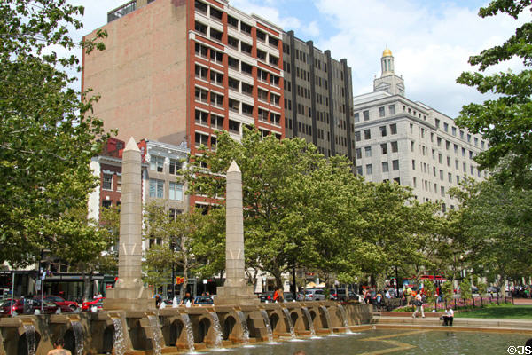 Boylston St. buildings opposite Copley Square with tower of New England Life Insurance Building. Boston, MA.