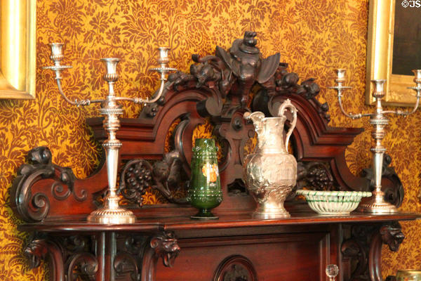 Silver pitcher & glass vase on dining room sideboard at Longfellow National Historic Site. Cambridge, MA.