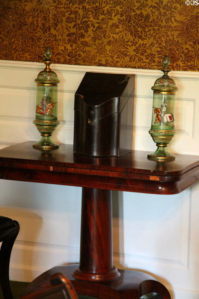 Green glass Germanic beakers on sidetable at Longfellow National Historic Site. Cambridge, MA.