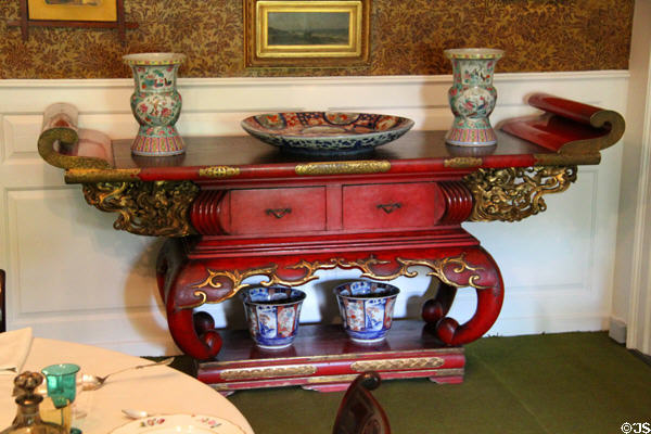 Red lacquer Buddhist altar table in dining room at Longfellow National Historic Site. Cambridge, MA.