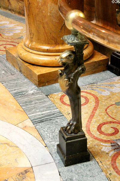 Bronze lion post holding up railing in rotunda of Massachusetts State House. Boston, MA.