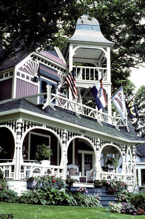 Victoria house with open tower at Woodland & Encampment Aves. Petosky, MI. Style: Eastlake & Queen Anne.