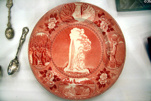 Antique souvenir Yellowstone Park plate with Old Faithful at Museum of the Yellowstone. West Yellowstone, MT.