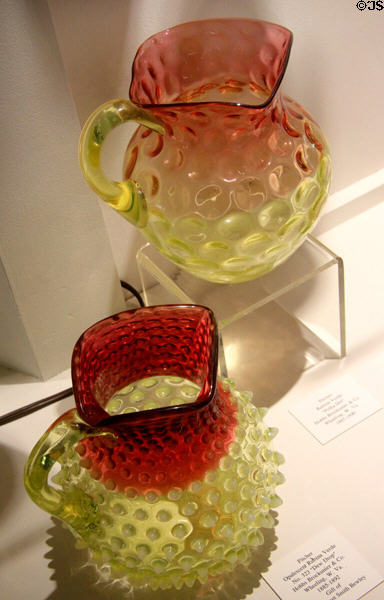 Rubina (red to yellow transition) glass pitchers (1885-92) by Hobbs, Brockunier & Co. of Wheeling, WV at Museum of American Glass. Milville, NJ.