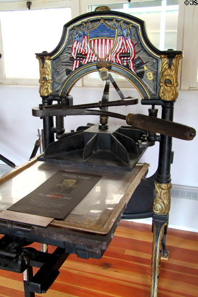 Cincinnati Type Foundery & Printers Warehouse printing press with flag design at New Mexico History Museum. Santa Fe, NM.
