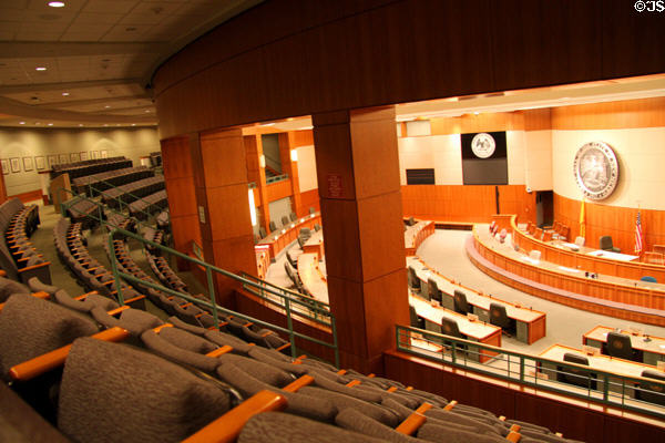 Public seating & representatives' desks in House chamber in New Mexico State Capitol. Santa Fe, NM.