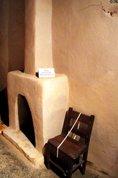 Chimney & chair at Hacienda de los Martinez. Taos, NM.