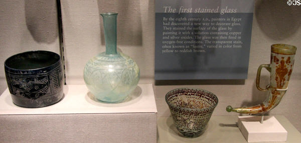 Display glass decorated with scratches or early stained glass (8th or 9thC) at Corning Museum of Glass. Corning, NY.