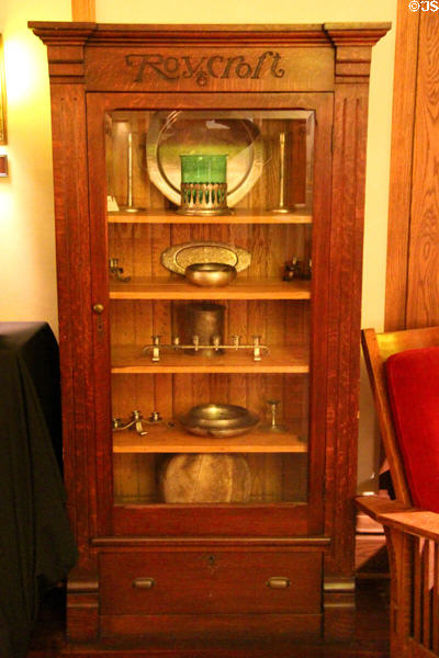Roycroft display case with Arts & Crafts objects at Roycroft Inn. East Aurora, NY.