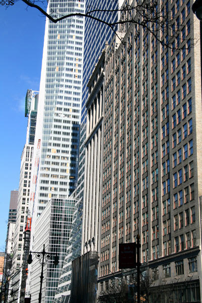 Streetscape of West 42nd St. from Fifth Ave. with Bank of America, HBO, Grace, State University College of Optometry (1912) by Warren & Wetmore, & Salmon Towers. New York, NY.