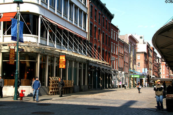 Front Street streetscape of Canon's Walk in South Street Seaport. New York, NY.