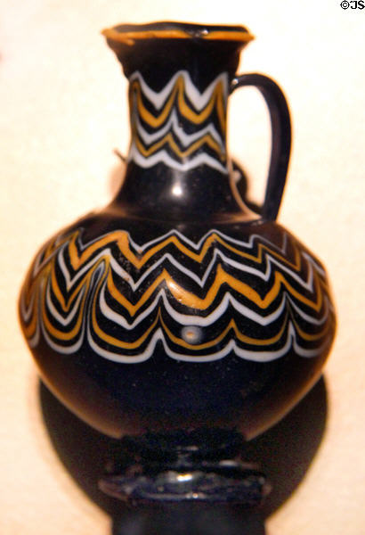 Egyptian core-formed glass bottle (c1390-1336 BCE / Dynasty 18) at Brooklyn Museum. Brooklyn, NY.