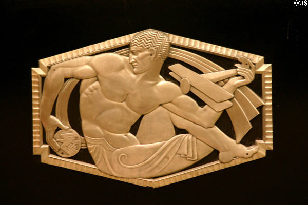 Art Deco relief of man holding biplane & postal emblem in lobby of Carew Tower. Cincinnati, OH.