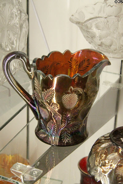 Pitcher with berry decoration at National Museum of Cambridge Glass. Cambridge, OH.