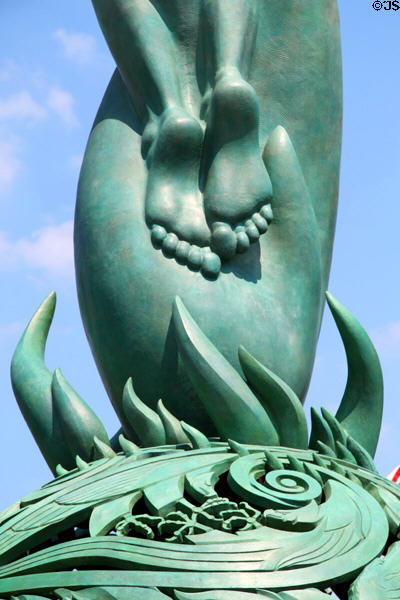 Detail of the feet of Peace above Flames of War on War Memorial Fountain. Cleveland, OH.