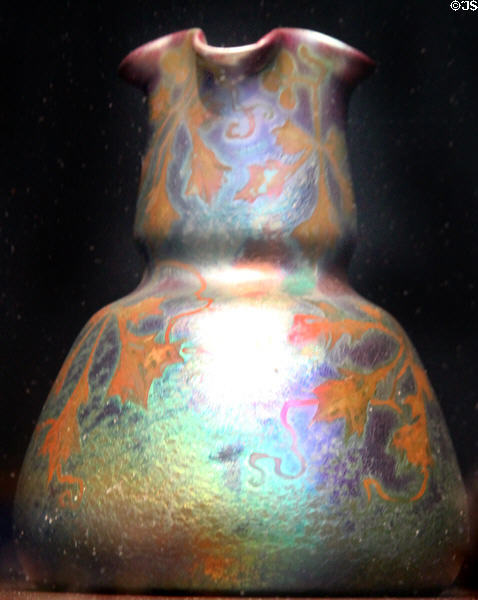 Earthenware vase with iridescent vines (1900-7) by Weller Pottery of Zanesville, OH at Cleveland Museum of Art. Cleveland, OH.