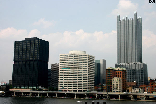 Black Westinghouse Tower, white National City Center & PPG Place over Monongahela River. Pittsburgh, PA.