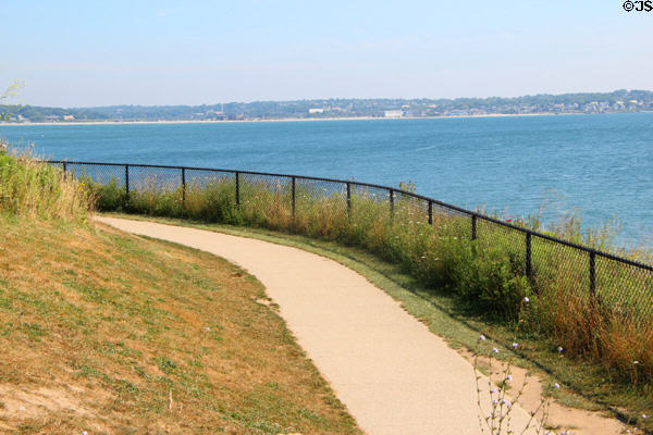 Cliff walk curves past The Breakers. Newport, RI.