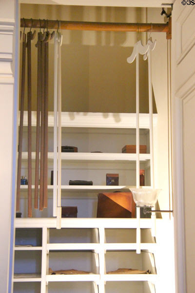 Vanderbilt closet with hangers to lift clothes to higher rack at The Breakers. Newport, RI.
