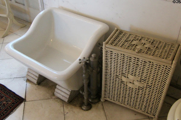Mr. Vanderbilt's sits bath & woven hamper at The Breakers. Newport, RI.