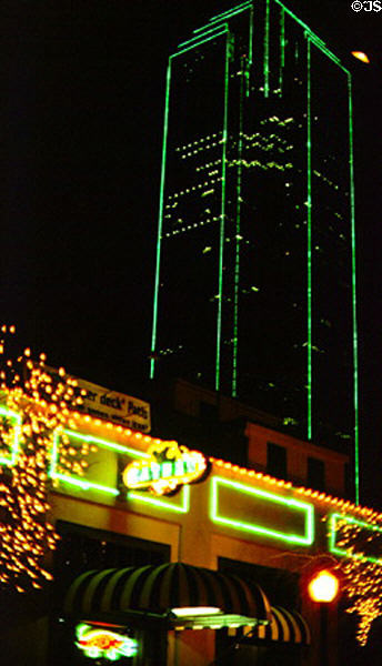 Bank of America Plaza at night with green lights. Dallas, TX.