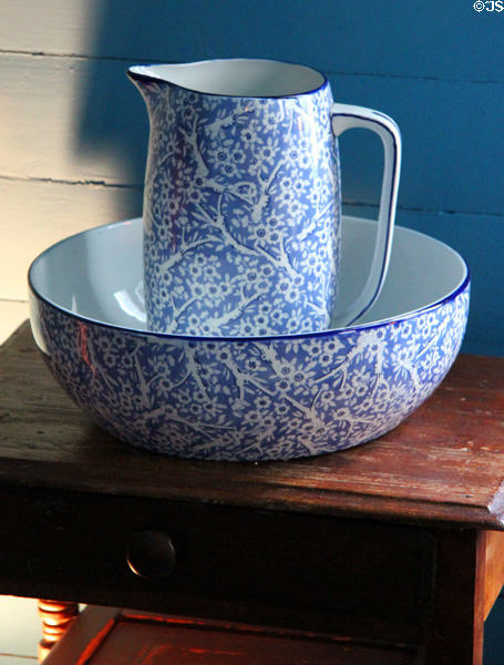 Blue & white china basin & pitcher in Yates House at Sam Houston Park. Houston, TX.