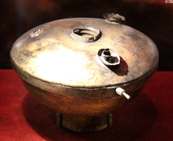 Three-wick gimballed ship's lantern (c1684) excavated from La Belle Shipwreck (lent: TX Historical Commission) at Bullock Texas State History Museum. Austin, TX.