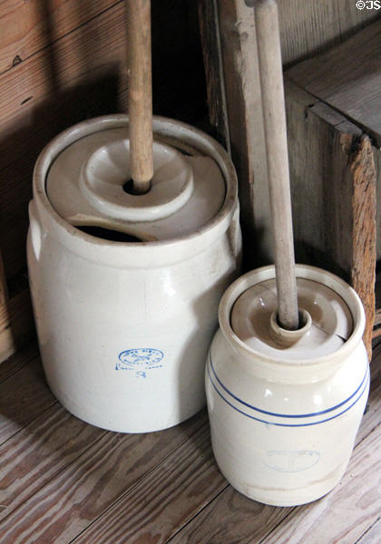 Stoneware butter churns at Pioneer Village. Gonzales, TX.