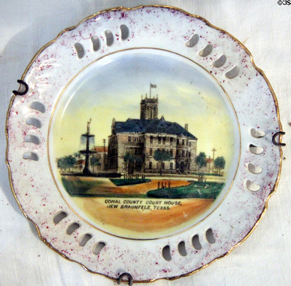 Commemorative plate depicting Comal County Court House in New Braunfels, TX at Conservation Plaza. New Braunfels, TX.