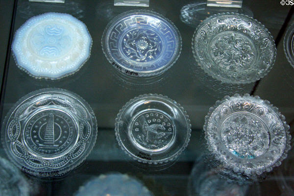 Collection of American pressed glass cup plates at Chrysler Museum of Art. Norfolk, VA.