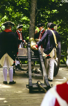 Preparing to fire a cannon at the Open Air Museum of Yorktown Victory Center. Yorktown, VA.