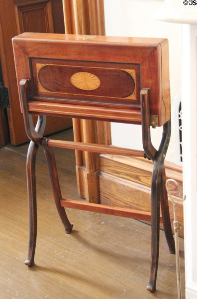 Folding case on legs with inlaid design at Park-McCullough Historic Estate. North Bennington, VT.