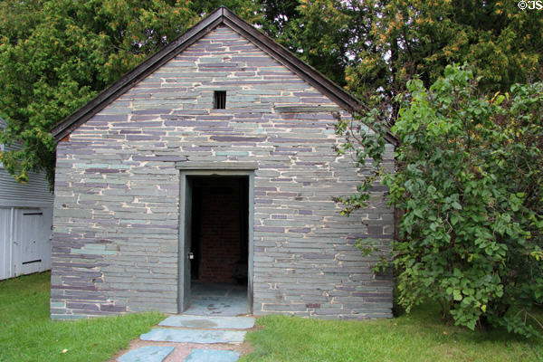 Jail with slate walls (1890) from Castleton, VT at Shelburne Museum. Shelburne, VT.