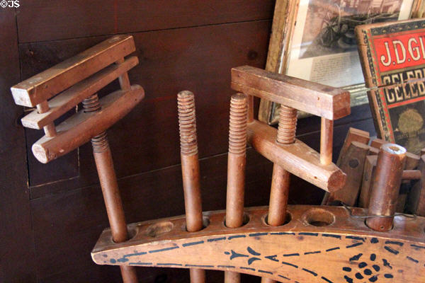 Mop handles in General Store at Shelburne Museum. Shelburne, VT.