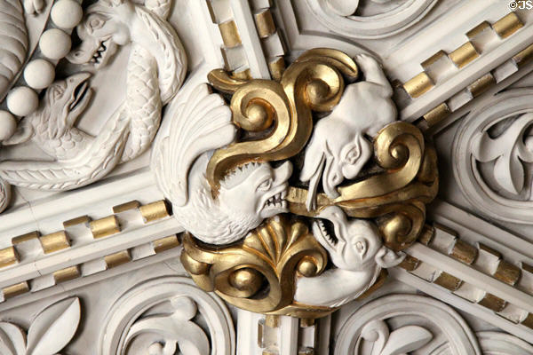 Detail of sculpted plaster figures on ceiling panel in Library at Penrhyn Castle. Bangor, Wales.