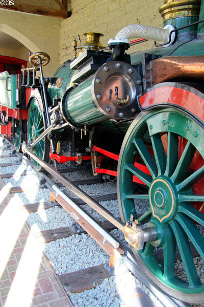 Wheels & water tank of Fire Queen tender locomotive (1848) built for Padarn Railway at Penrhyn Castle Rail Museum. Bangor, Wales.