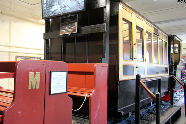 Quarrymen's open coach (1879 - 1951) which conveyed workers to & from the quarry at Bethesda along with saloon coach (c1882) used by Lord Penrhyn, quarry officials & visitors at Penrhyn Castle Rail Museum. Bangor, Wales.