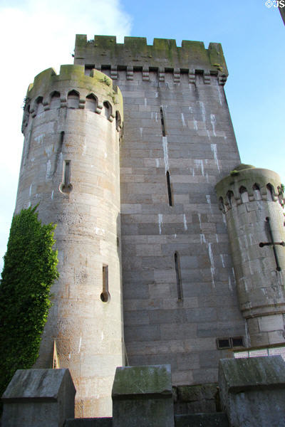 Robert Stephenson's railway bridge with masonry towers topped with battlements & turrets to harmonize with Conwy Castle. Conwy, Wales.