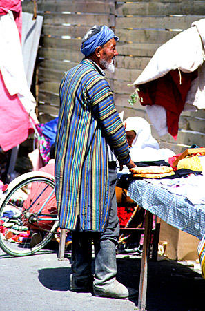 Man at bazaar in Bukhara. Uzbekistan.