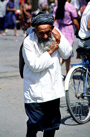 Man at bazaar in Bukhara. Uzbekistan.