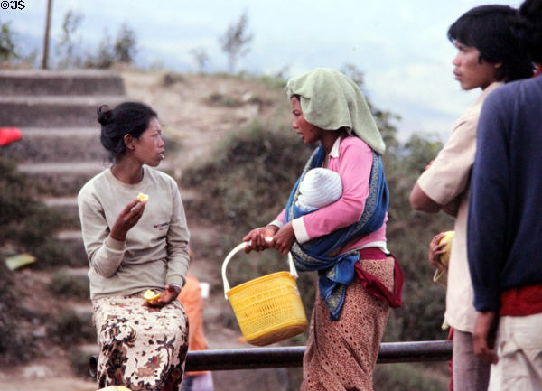 Two Balinese women talking. Bali, Indonesia.