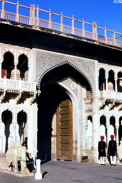 Guards & statues guard Palace of Jaipur. India.