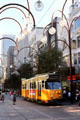 Streetcar runs under lights hanging along Melbourne Mall. Melbourne, Australia.