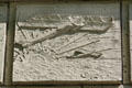 Terra cotta biplane over rising sun on Marine Building. Vancouver, BC.