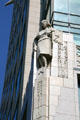 Carved nurse on facade of Cathedral Place. Vancouver, BC.