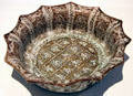 Luster Fritware basin painted with fowl & rabbits from Iran at Aga Khan Museum. Toronto, ON.