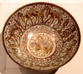 Luster Fritware bowl painted with camel train from Iran at Aga Khan Museum. Toronto, ON.