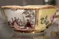 Meissen porcelain bowl from tea service decorated with scene inspired by Antoine Watteau in white rectangle at Gardiner Museum. Toronto, ON.